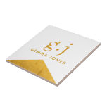 Monogram Elegant Gold Faux Foil White Ceramic Tile<br><div class="desc">An elegant gold and white ceramic tile for home or business, featuring a simple clean modern minimalist gold monogram with simple lower case serif typography initials, and a faux gold foil triangle shape accent on white. A punctuation mark (period) divides the first and last initial as a simple design element...</div>