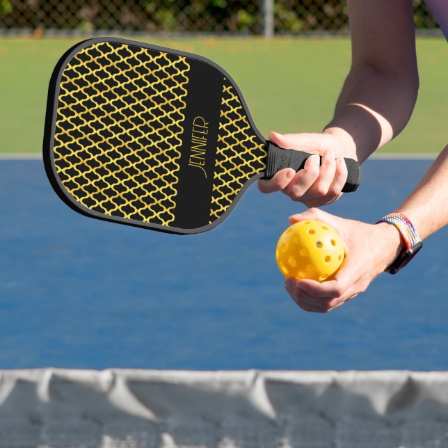 Monogram gold and black quatrefoil pattern pickleball paddle (Insitu)