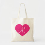 Monogram hot pink heart tote bag<br><div class="desc">This canvas bag features a shapely hot pink heart overlaid by a template text monogram initial.  Click "Customise" to re-size/re-position hot pink heart ,  personlize text or monogram with your choice of font style,  size,  and colour. Great bridesmaid gift.</div>