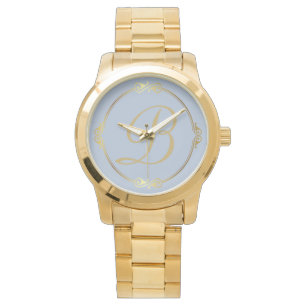 Monogram in gold with infinity circle on Blue Watch