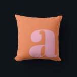 Monogram Initial Letter Bold Pink Orange Playful Cushion<br><div class="desc">A bold and stylish throw pillow featuring a warm orange background with a large pink lowercase letter in modern typography. This eye-catching design adds a playful yet sophisticated touch to any space, making it perfect for contemporary, mid-century, or eclectic home decor. A great statement piece for living rooms, bedrooms, or...</div>