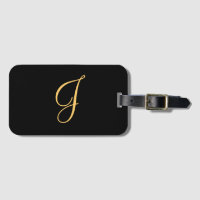 Monogram J, gold coloured initial J on black