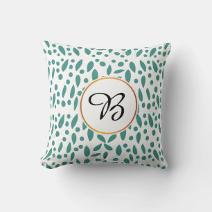 monogram & leaves patterned cushion
