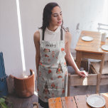 Monogram | Mid-Century Modern Christmas Apron<br><div class="desc">Cute hand drawn illustrations that depict a Mid-Century Modern holiday theme. Full of charm these designs invoke festive nostalgia. Classy and fashionable this apron makes the perfect fashion accessory. Add your custom wording to this design by using the "Edit this design template" boxes on the right hand side of the...</div>
