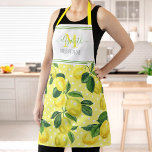 Monogram modern rustic lemon watercolor polka dot apron<br><div class="desc">Here’s a wonderful way to add to the fun of baking. Add extra sparkle to your culinary adventures whenever you wear this beautiful, chic, trendy, modern, custom monogram name apron. Fresh, rustic, country watercolor lemons and green leaves, along with grass green handwritten script typography, overlay white polka dots on a...</div>