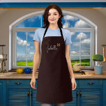 Monogram name black gold apron<br><div class="desc">A stylish black background. Personalise and add your first name and monogram initial.  White and golden text.</div>