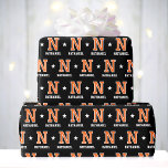 Monogram Name Star Orange Black Custom Wrapping Paper<br><div class="desc">Elevate your gift-giving with monogrammed wrapping paper! This sports jersey-style pattern features a retro block-style font, stars, and is personalised with a monogram initial and the recipient's name. You can also customise the background colour by using the design editor tool. A stylish design that would suit many occasions, including Christmas,...</div>