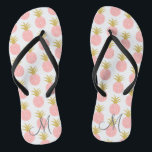 Monogram Pink and Gold Pineapple Thongs<br><div class="desc">Fun tropical flip flops adorned with a glitter pink and gold pineapple pattern with your initial. Customise the monogram font style and colour to suit your personal style. Variety of strap colours available, customise your style. Perfect for beach brides and bridesmaids, or a fun new pair o flip flops for...</div>
