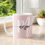 Monogram Stylish Modern Cute Blush Pink Coffee Mug<br><div class="desc">Sip your favourite beverage in style with this Monogram Stylish Modern Cute Blush Pink Coffee Mug. Featuring a sleek and modern design, this mug showcases a soft blush pink background accented with a personalised monogram in elegant script. Its durable ceramic construction ensures long-lasting use, while the comfortable handle makes every...</div>