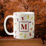 Monogrammed Autumn Fall Leaves Horse Pattern Coffee Mug<br><div class="desc">An autumn leaf pattern, but it's galloping horses! A variety of equines in cosy reds, yellows, and oranges make up this fall favourite. One side features a customisable simple yet elegant monogram. Customise and gift it to your instructor or trainer to help them have a warm and cosy day after...</div>