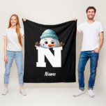 Monogrammed Family Christmas Custom Cute Snowman Fleece Blanket<br><div class="desc">Add a charming touch to your family's Christmas celebrations with our Monogrammed Family Christmas Custom Cute Snowman Fleece Blanket. This personalised fleece blanket is perfect for keeping your loved ones warm and cosy during the holiday season. Customise this blanket with your family's names and create a unique keepsake that's ideal...</div>