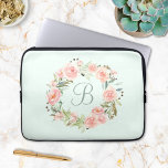 Monogrammed Pastel Pink Flower Wreath Laptop Sleeve<br><div class="desc">Elevate your laptop style with our Monogrammed Pink Blush Flower Wreath Laptop Sleeve. Personalised elegance for girls and women on the go</div>