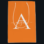 Monogrammed Tangerine Orange | Minimalist Elegant Medium Gift Bag<br><div class="desc">Introducing our stylish custom monogram design, featuring a modern and minimalist white typography set against a Tangerine orange background. This sophisticated design is fully customisable with your own monogram initials, and script name, making it as unique as you are! Whether you're looking for the perfect bespoke gift or a chic...</div>