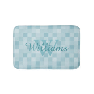 Monogrammed teal blue mozaic tile pattern bath mat