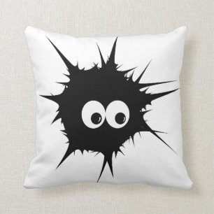 Monster in black cushion