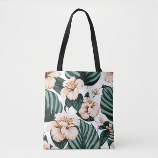 Monstera leaves hibiscus tote bag