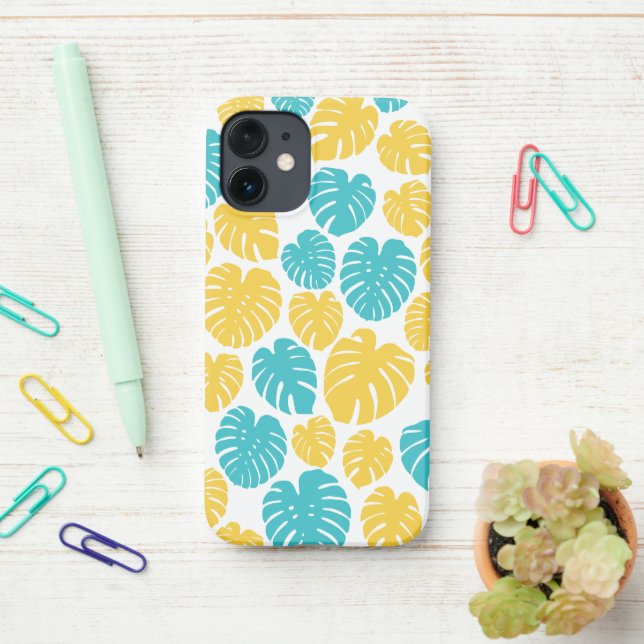 Monstera Leaves in Turquoise, Yellow, and White iPhone Case (On Desk)