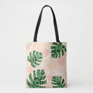 Monstera leaves on pink. tote bag