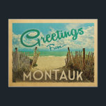 Montauk Beach Vintage Travel Postcard<br><div class="desc">This Greetings From Montauk vintage postcard design features a sandy beach with a beautiful turquoise ocean water and above the sea,  a blue sky with billowy white clouds. In vintage travels style.</div>