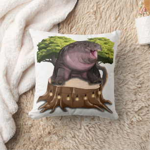Moo Deng Hippo sits on a tree. Cushion