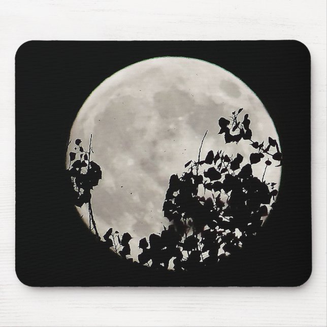Moon behind dark leaves mouse pad (Front)