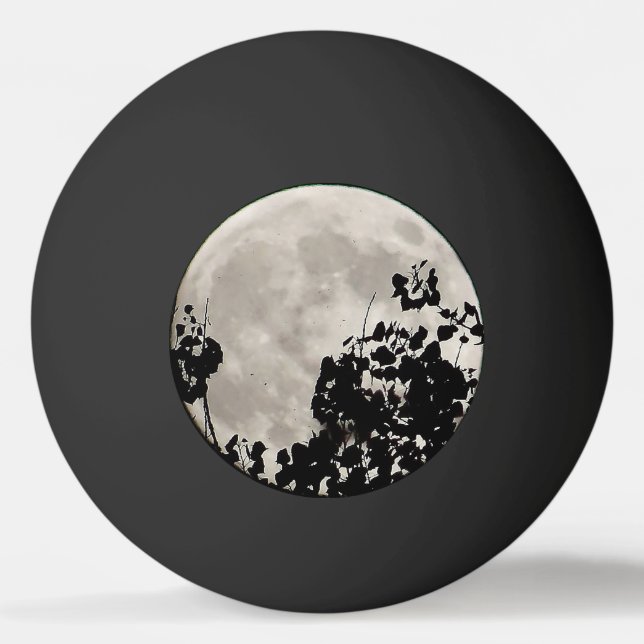 Moon behind dark leaves ping pong ball (Front)