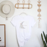 Moon Child | Boho Hippie Mama T-Shirt<br><div class="desc">This mama t shirt features a bohemian floral moon and a cute handwritten font. This shirt is perfect to announce that you're expecting or give as a gift for the best mum in your life. It doesn’t get more Boho Chic than this “Stay Wild Moon Child Baby Shower”. Featuring dreamy...</div>