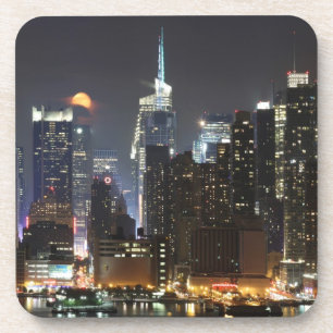 Moon rises over midtown New York. Coaster