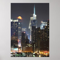 Moon rises over midtown New York.
