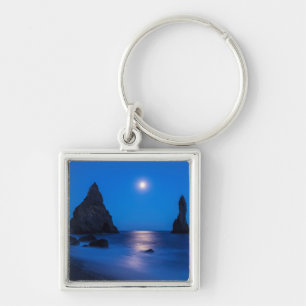 Moonrise reflection on ocean and sea stacks key ring