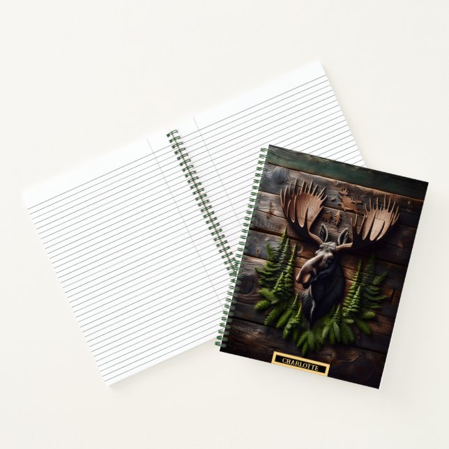 Moose head mounted on rustic wooden wall in nature notebook (Inside)