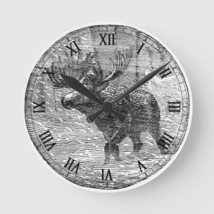 Moose in Snow Emblem Round Clock