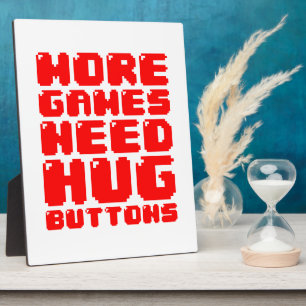 MORE GAMES NEED HUG BUTTONS PLAQUE