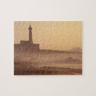 Morocco, Rabat, Lighthouse at sunset with Jigsaw Puzzle