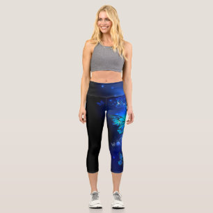 Morpho Butterfly in the Dark Background Capri Leggings
