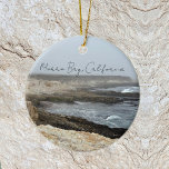 Morro Bay California Coastal Photography Ceramic Ornament<br><div class="desc">A foggy overcast day in Morro Bay California with the ocean waves hitting the rocks on the shore in this beach photograph. This seaside travel photo Christmas ornament features black cursive script above the beach rocks and grey sky.</div>