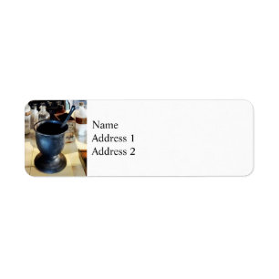 Mortar and Pestle Near Medicine Bottles Return Address Label