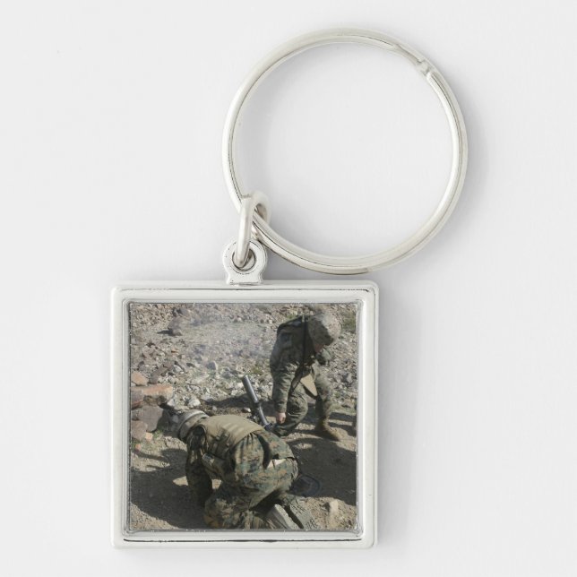 Mortarmen cover their ears and avert their eyes key ring (Front)