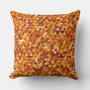 Mosaic of hexagons on spots in reddish tones cushion