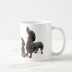 Mosquito with two dogs, dachshund coffee mug