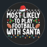 Most Likely To Play Football With Santa Christmas Classic Round Sticker<br><div class="desc">Most Likely To Play Football With Santa Christmas</div>