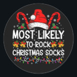 Most Likely To Rock Christmas Socks Funny Xmas Classic Round Sticker<br><div class="desc">Most Likely To Rock Christmas Socks Funny Xmas</div>