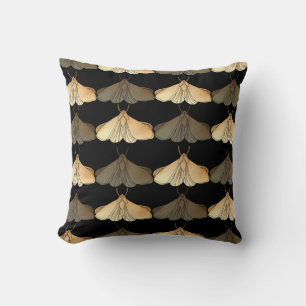 Moth in gold pattern cushion