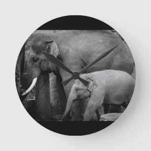 mother and baby elephant round clock