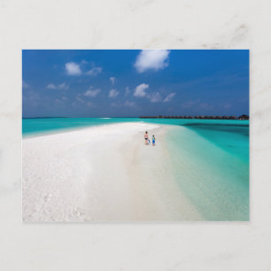 Mother and son at tropical beach postcard