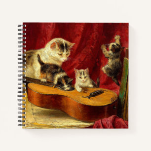 Mother Cat and Kittens Playing with Guitar Notebook