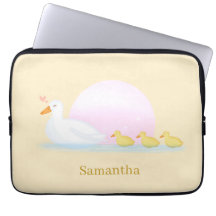 Mother Duck Swimming With Her Family