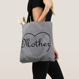 Mother heart on close up of a white rose tote bag