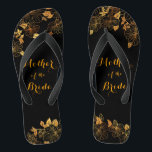 Mother of the Bride Black & Gold Foliage Pattern Thongs<br><div class="desc">These gorgeous Mother of the Bride black and gold foliage flip flops boasts a luxurious black and gold palette, with a stunning golden floral pattern and modern typography set against a black background, exuding elegance and sophistication. It's a beautiful gift for your bridal party. View the collection on this page...</div>
