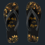 Mother of the Bride Luxury Black & Gold Foliage Thongs<br><div class="desc">These gorgeous Mother of the Bride Luxury black and gold foliage flip flops boasts a luxurious black and gold palette, with a stunning golden floral pattern and modern typography set against a black background, exuding elegance and sophistication. It's a beautiful gift for your bridal party. View the collection on this...</div>